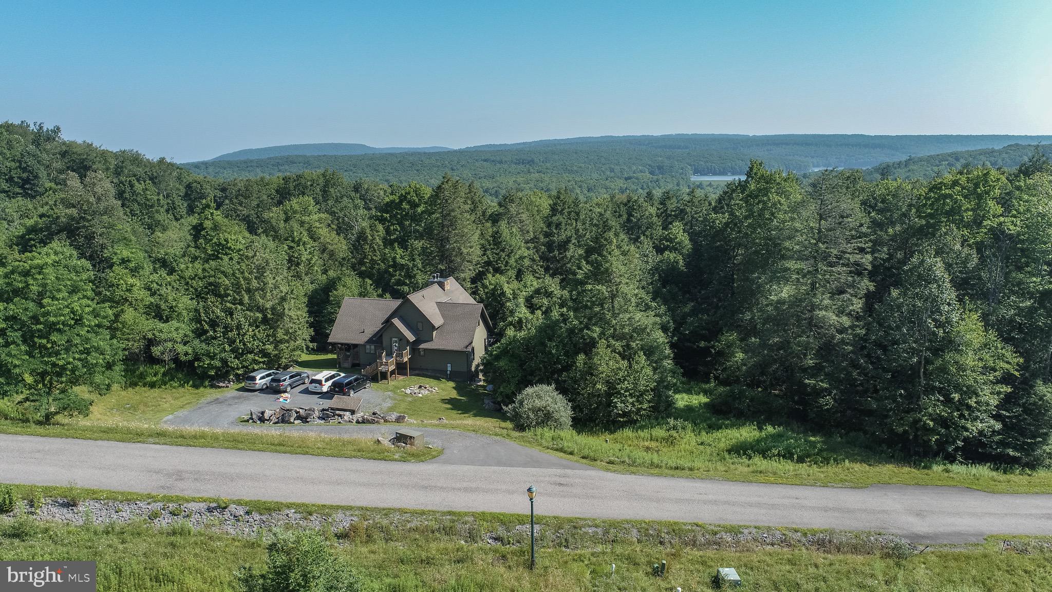 Lot 13 Bray Run Road Oakland, MD 21550 - Photo 10 of 23 an aerial view of a house with yard and trees in the background