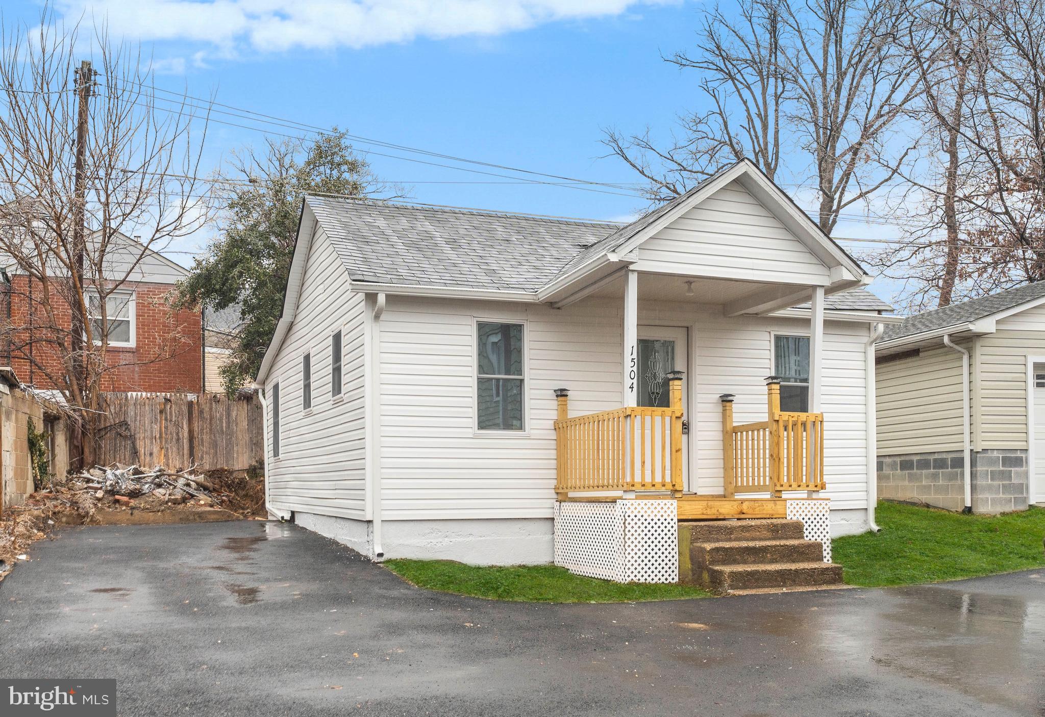 1504 Taylor Avenue, Unit B Parkville, MD 21234 - Photo 2 of 20 a front view of a house with a garage