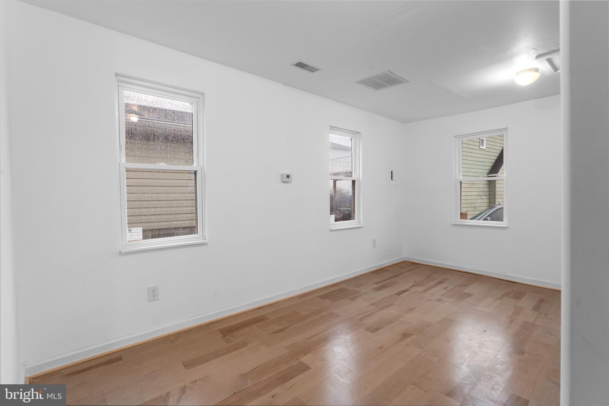 1504 Taylor Avenue, Unit B Parkville, MD 21234 - Photo 10 of 20 an empty room with windows