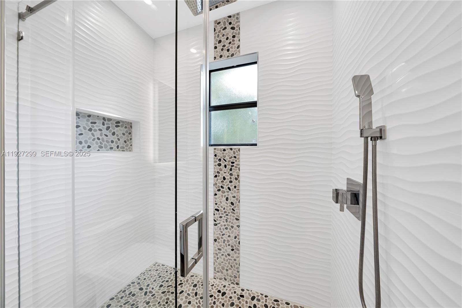 11448 Southwest 151st Path Miami, FL 33196 - Photo 27 of 35 a bathroom with a shower