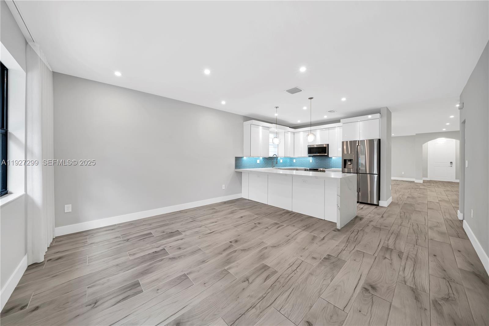 11448 Southwest 151st Path Miami, FL 33196 - Photo 30 of 35 a view of kitchen with wooden floor