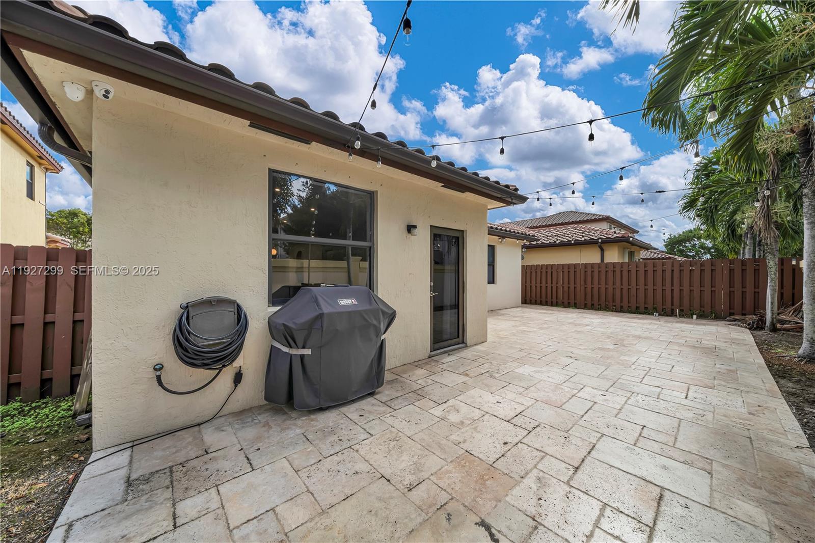 11448 Southwest 151st Path Miami, FL 33196 - Photo 32 of 35 a view of a porch with seating space