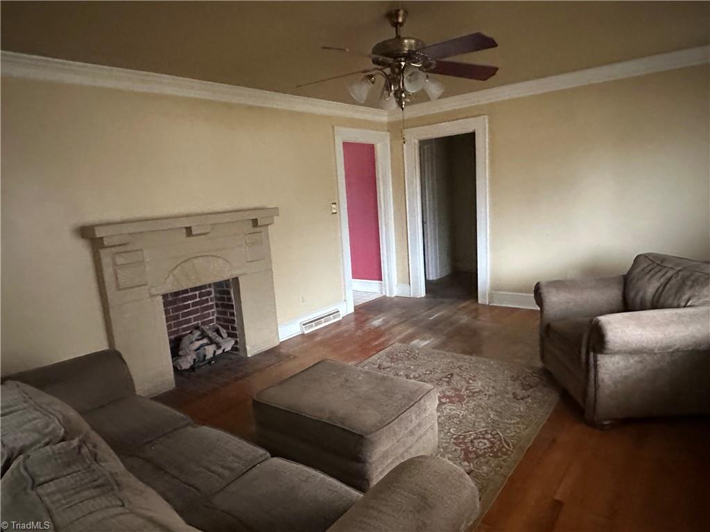 195 Rowe Road Lexington, NC 27295 - Photo 7 of 20 Living room. Fireplace has gas logs.