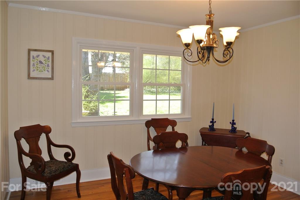 173 Tanner Street Rutherfordton, NC 28139 - Photo 11 of 25 a view of a dining room with furniture window and outside view
