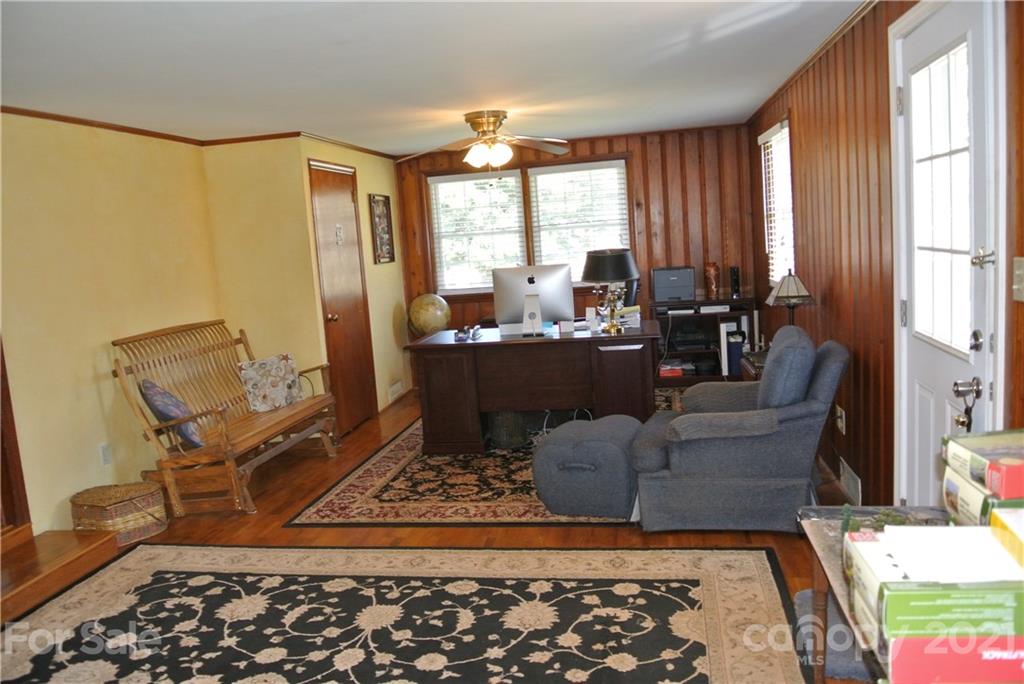 173 Tanner Street Rutherfordton, NC 28139 - Photo 20 of 25 a living room with furniture and a rug