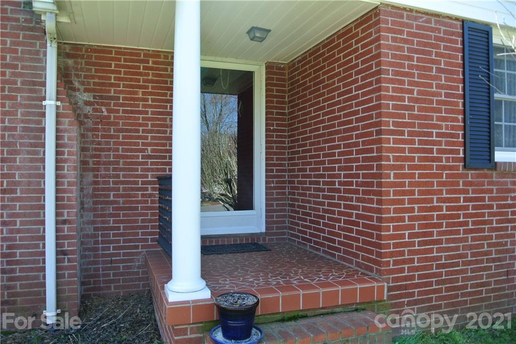 173 Tanner Street Rutherfordton, NC 28139 - Photo 3 of 25 a view of brick walls