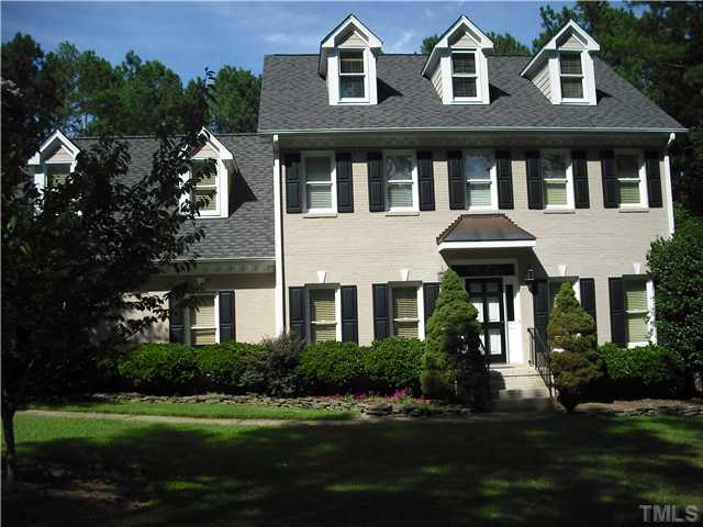 6836 Cool Pond Road Raleigh, NC 27613 - Photo 1 of 12 a front view of a house with a yard