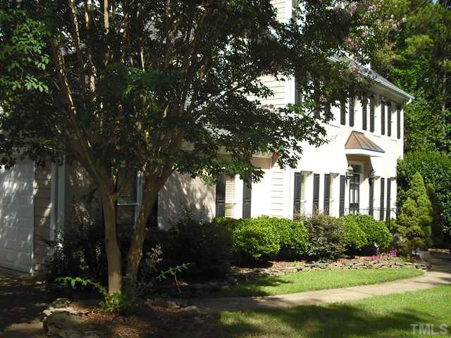 6836 Cool Pond Road Raleigh, NC 27613 - Photo 11 of 12 a front view of a house with a yard