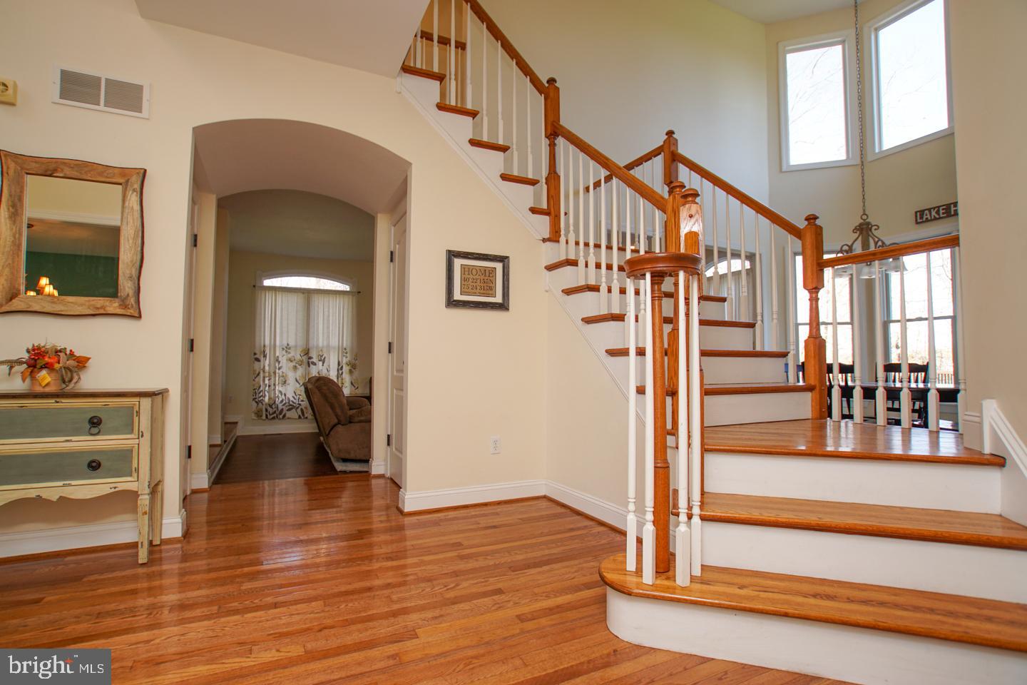 3071 Long Road Green Lane, PA 18054 - Photo 3 of 106 a view of an entryway with wooden floor and a livingroom view
