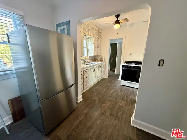 a view of car parked in front of building