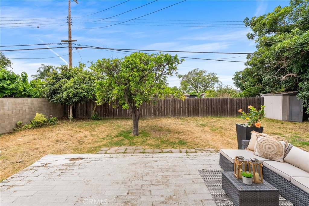13361 Roxey Drive Garden Grove, CA 92843 - Photo 20 of 31 a backyard of a house with lots of green space