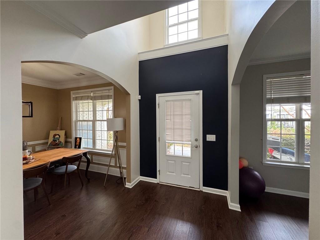 524 King Street Suwanee, GA 30024 - Photo 2 of 23 a bedroom with furniture and a wooden floor