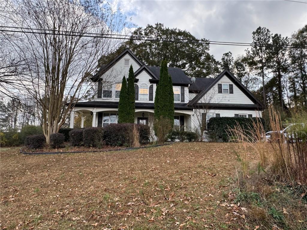524 King Street Suwanee, GA 30024 - Photo 23 of 23 a front view of a house with a yard