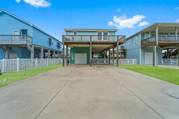 a view of a lake with a city from a balcony