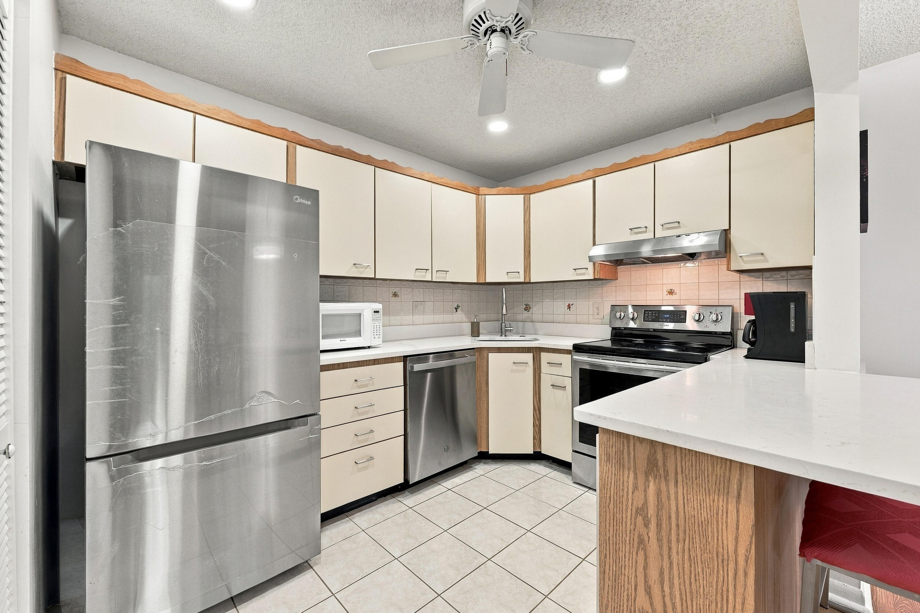 313 Pine Ridge Circle, Unit C2 Greenacres, FL 33463 - Photo 8 of 35 Kitchen Area