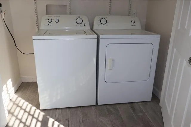 a utility room with dryer and washer