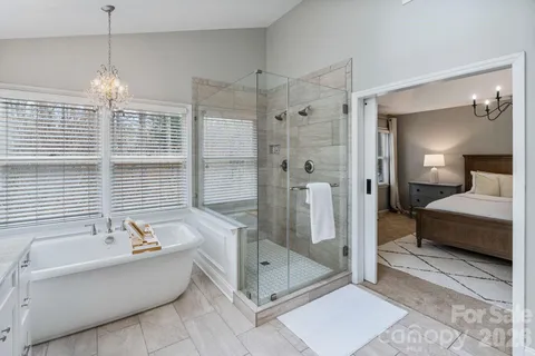 a bathroom with a granite countertop sink a mirror and a