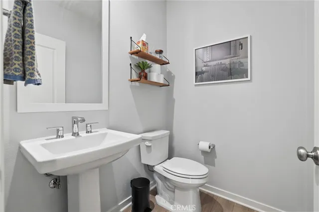 a white bath tub sitting next to a shower