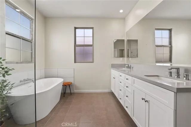 a bathroom with a sink a toilet and bathtub