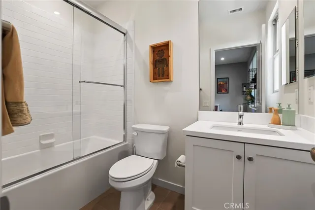 a view of a backyard with furniture and a fire pit