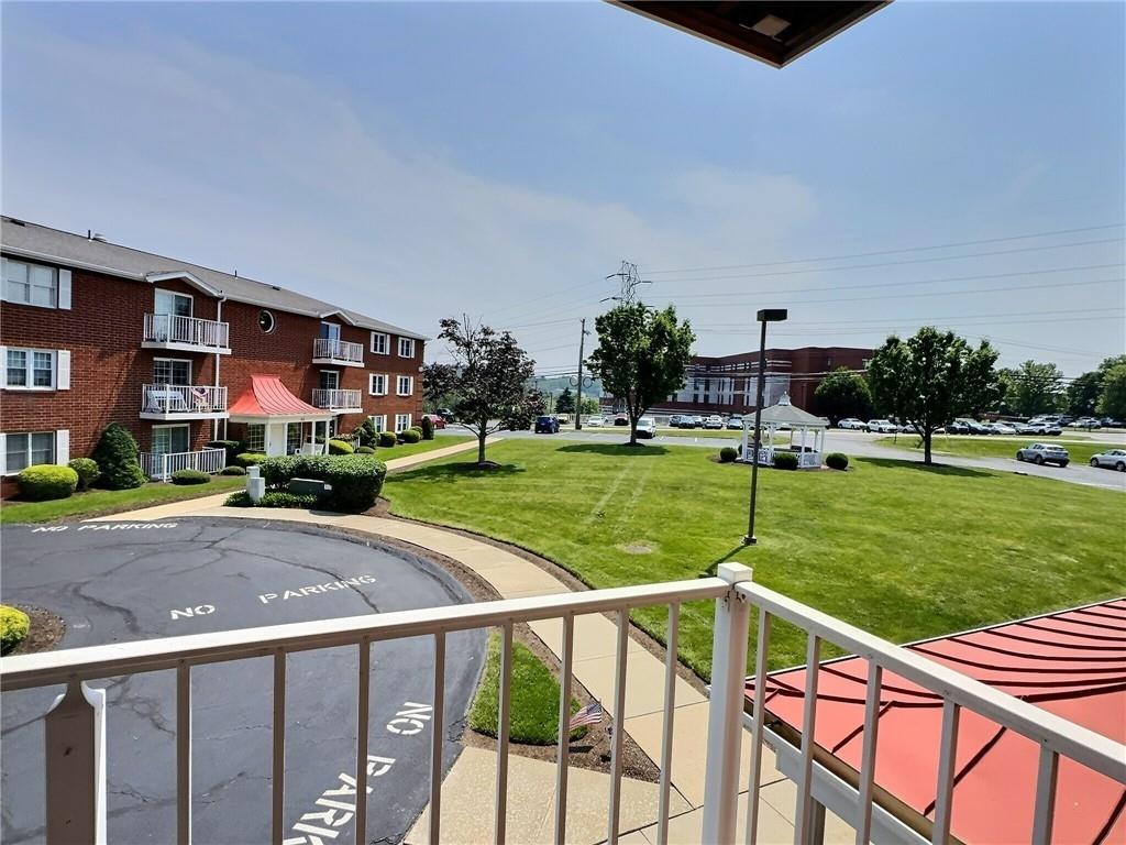 830 South Main Street, Unit 206 Washington, PA 15301 - Photo 3 of 19 a view of a house with a yard