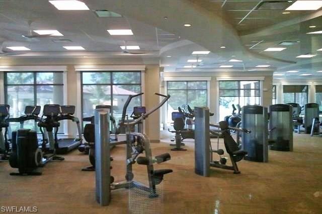 9560 Trevi Court, Unit 4816 Naples, FL 34113 - Photo 24 of 31 a view of a room with gym equipment