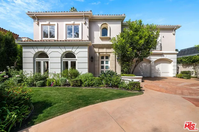 a front view of house with a yard