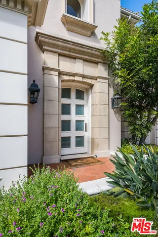 a front view of a house with a garage