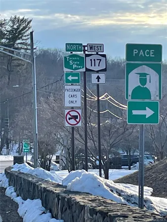 a view of a chairs and table in a backyard
