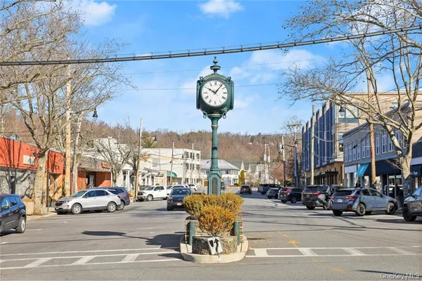 a view of a street with cars