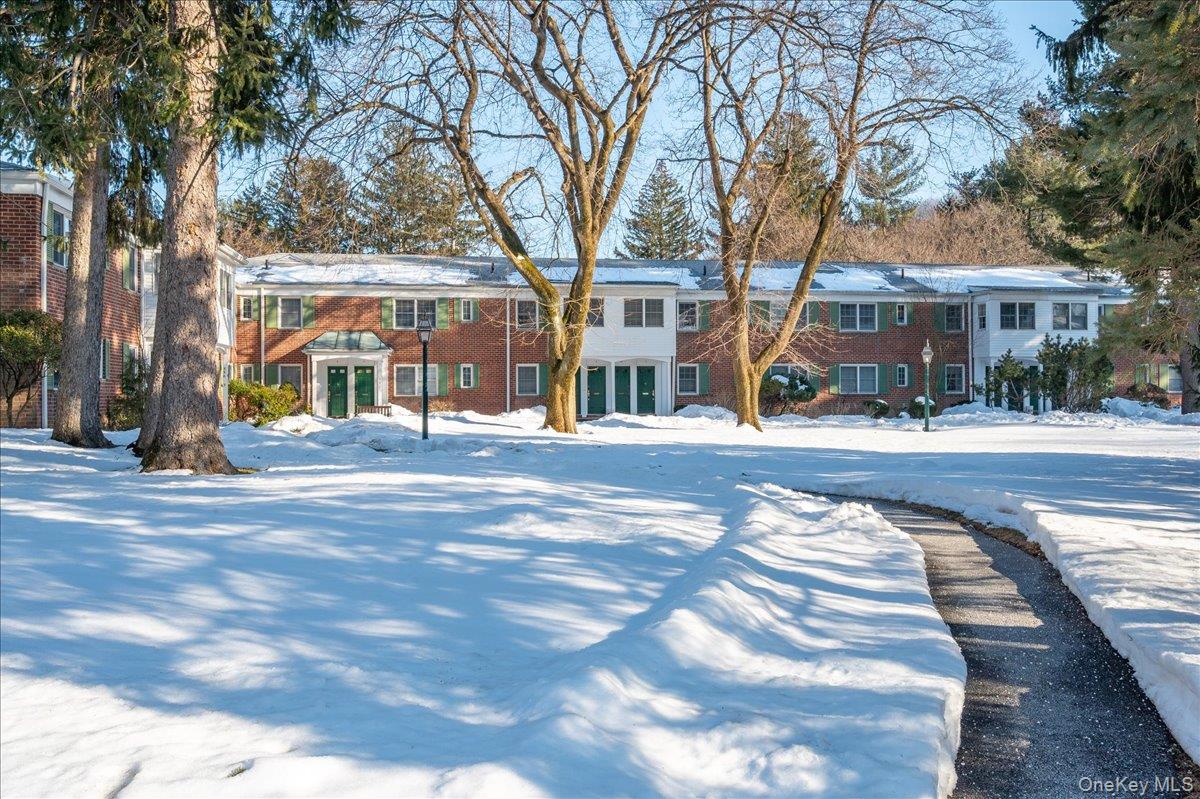 580 Bedford Road, Unit 8 Pleasantville, NY 10570 - Photo 2 of 35 a view of a building with a trees