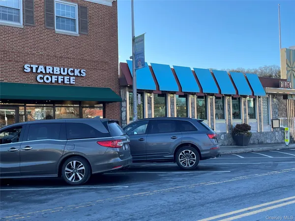 a car parked in front of a building