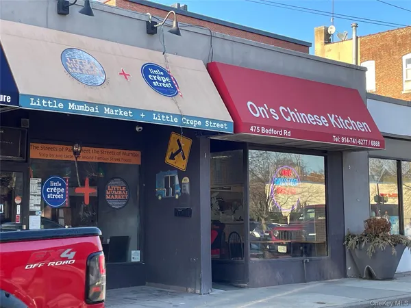 a cafe on the corner of the street