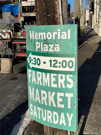 a group of people sitting outside a of the area