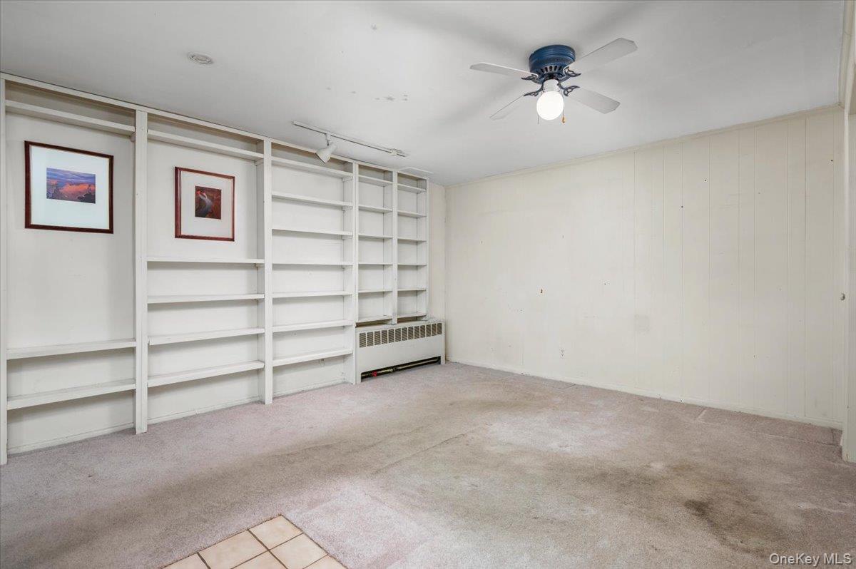 580 Bedford Road, Unit 8 Pleasantville, NY 10570 - Photo 7 of 35 a view of room with balcony and a ceiling fan