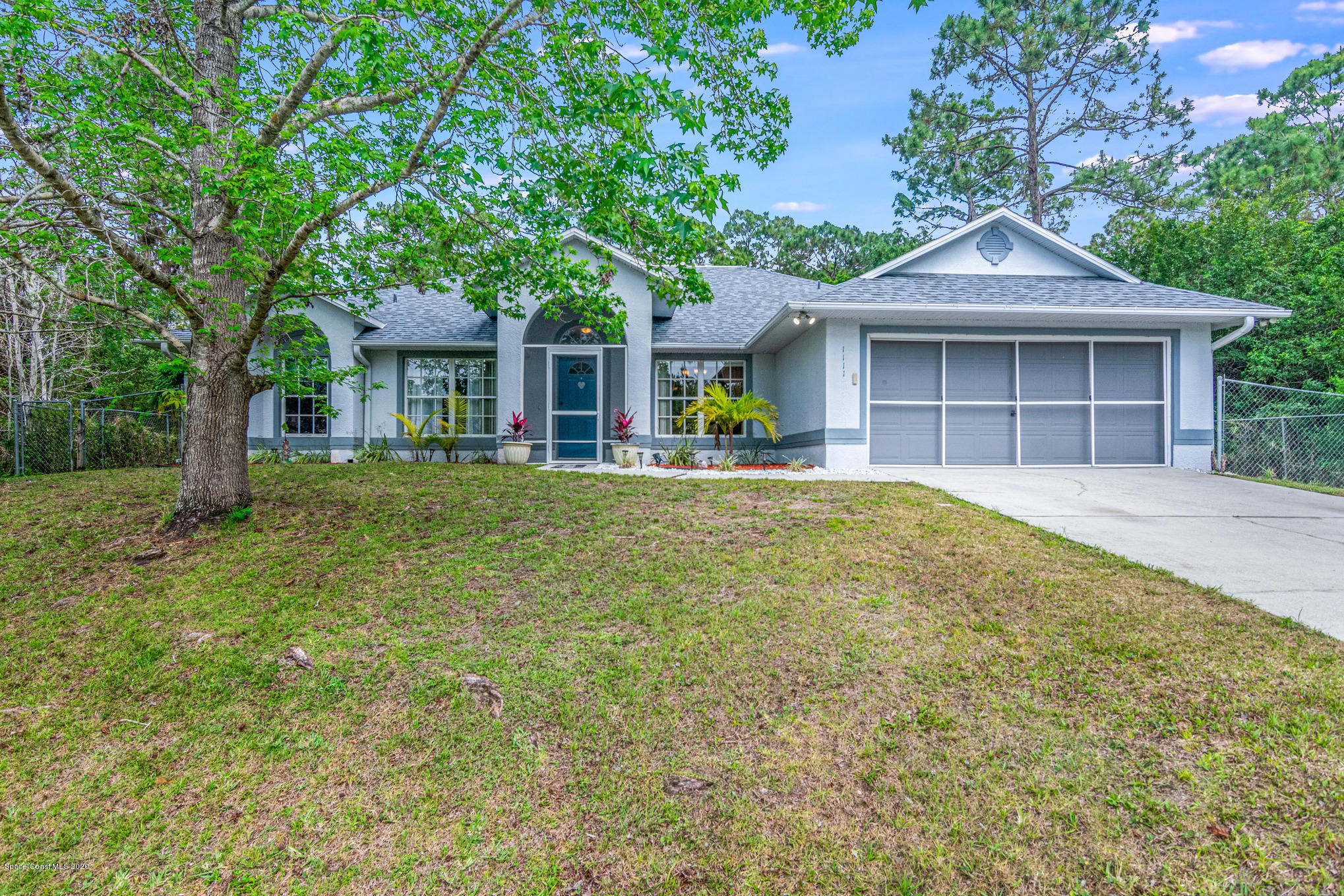 1111 Satin Road Palm Bay, FL 32908 - Photo 1 of 32 Front of Home