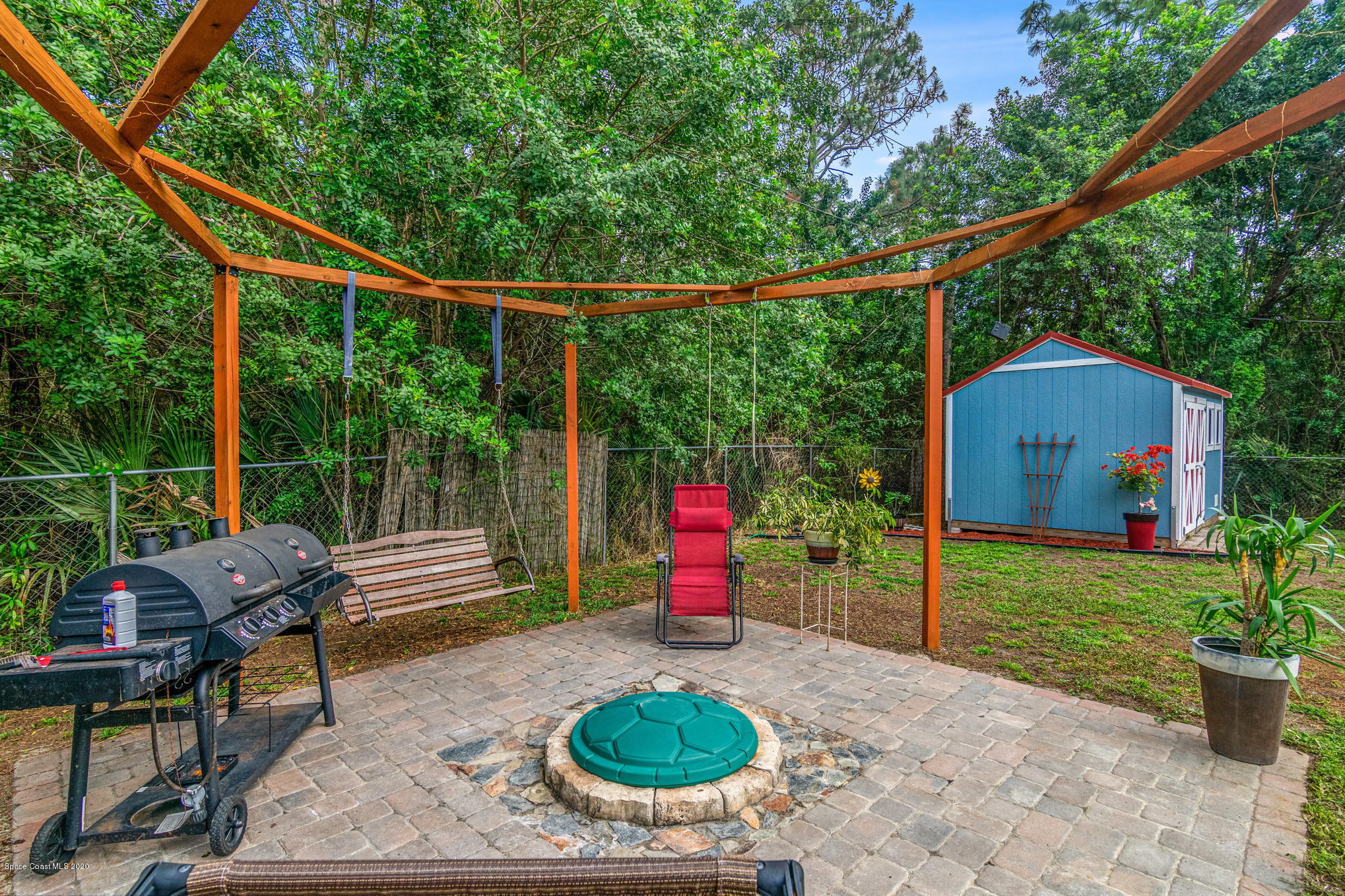 1111 Satin Road Palm Bay, FL 32908 - Photo 27 of 32 Patio/Fire Pit