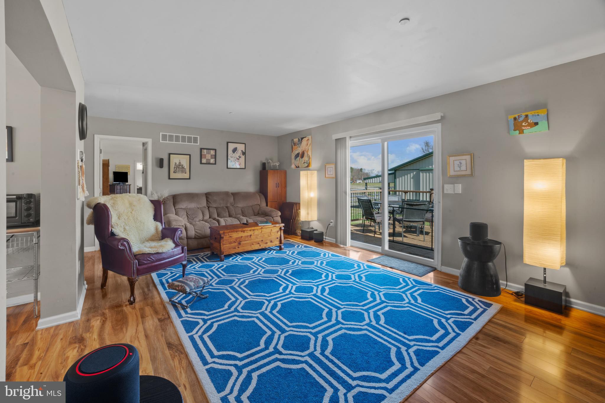 26268 Baker Road Denton, MD 21629 - Photo 12 of 55 a bedroom with a bed and wooden floor