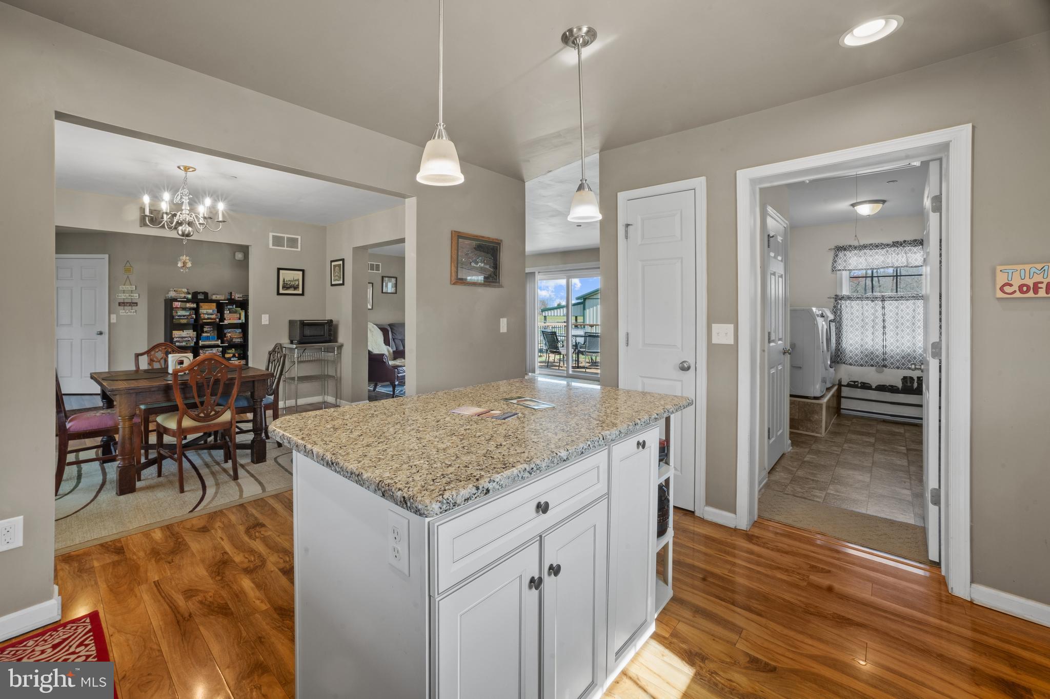 26268 Baker Road Denton, MD 21629 - Photo 16 of 55 a view of a kitchen and dining table