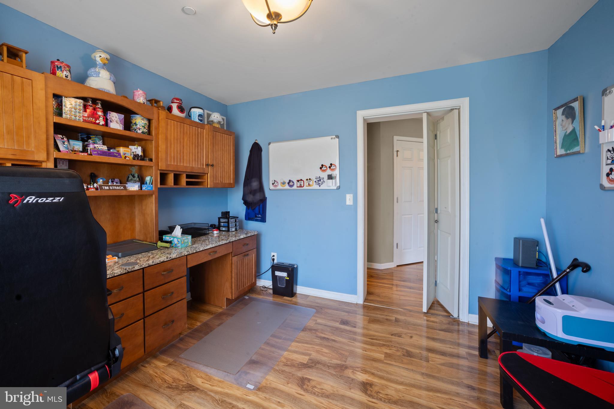 26268 Baker Road Denton, MD 21629 - Photo 19 of 55 a kitchen with stainless steel appliances granite countertop a stove a sink and a refrigerator