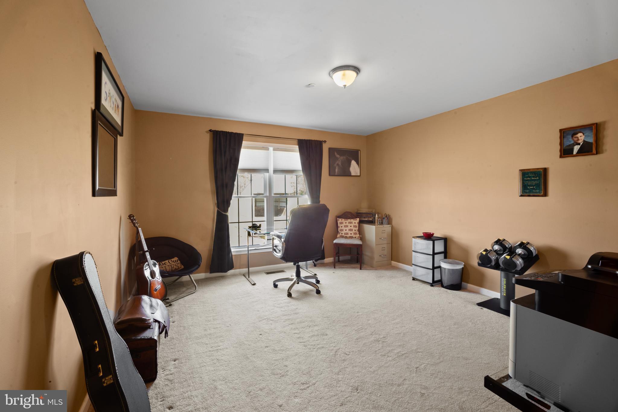 26268 Baker Road Denton, MD 21629 - Photo 23 of 55 a view of a workspace with furniture and a window