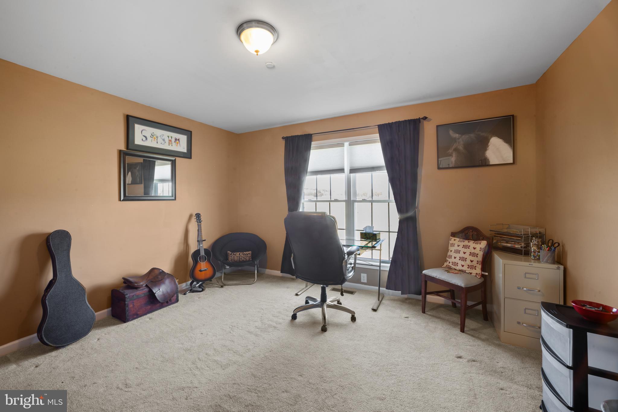 26268 Baker Road Denton, MD 21629 - Photo 24 of 55 a view of a workspace with furniture and a window