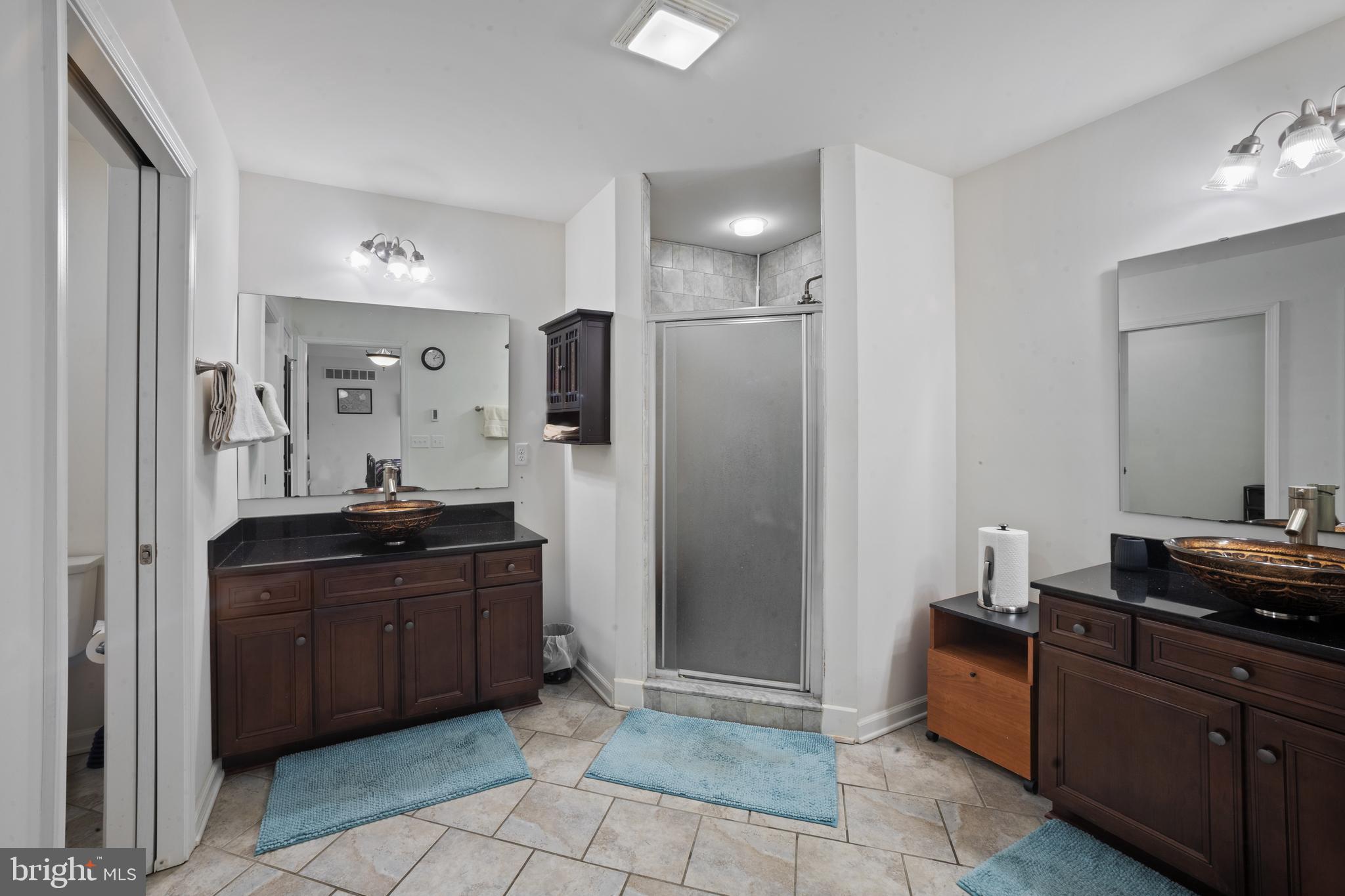 26268 Baker Road Denton, MD 21629 - Photo 28 of 55 a kitchen with a refrigerator and a sink