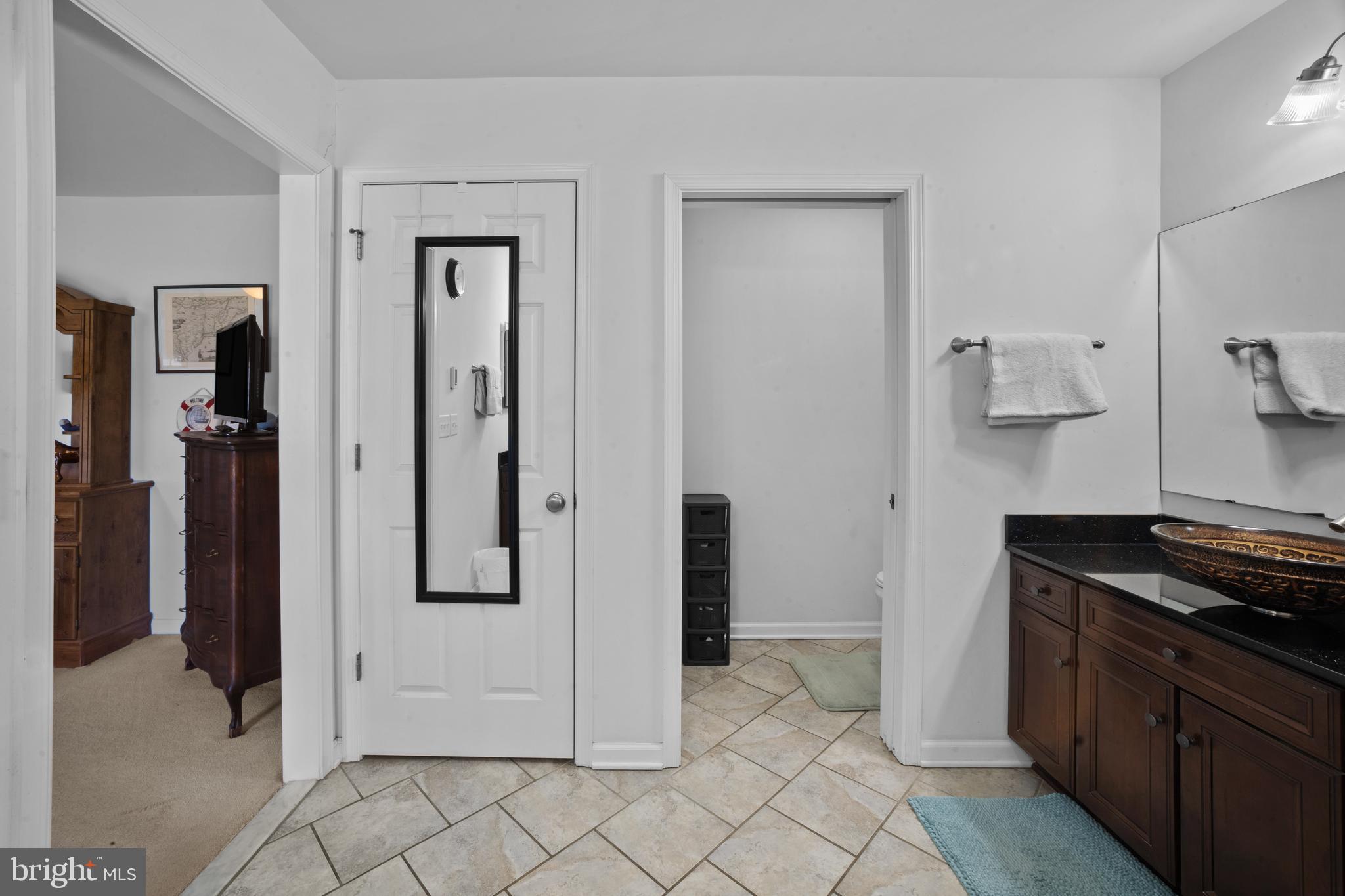 26268 Baker Road Denton, MD 21629 - Photo 30 of 55 a kitchen with a refrigerator and a stove