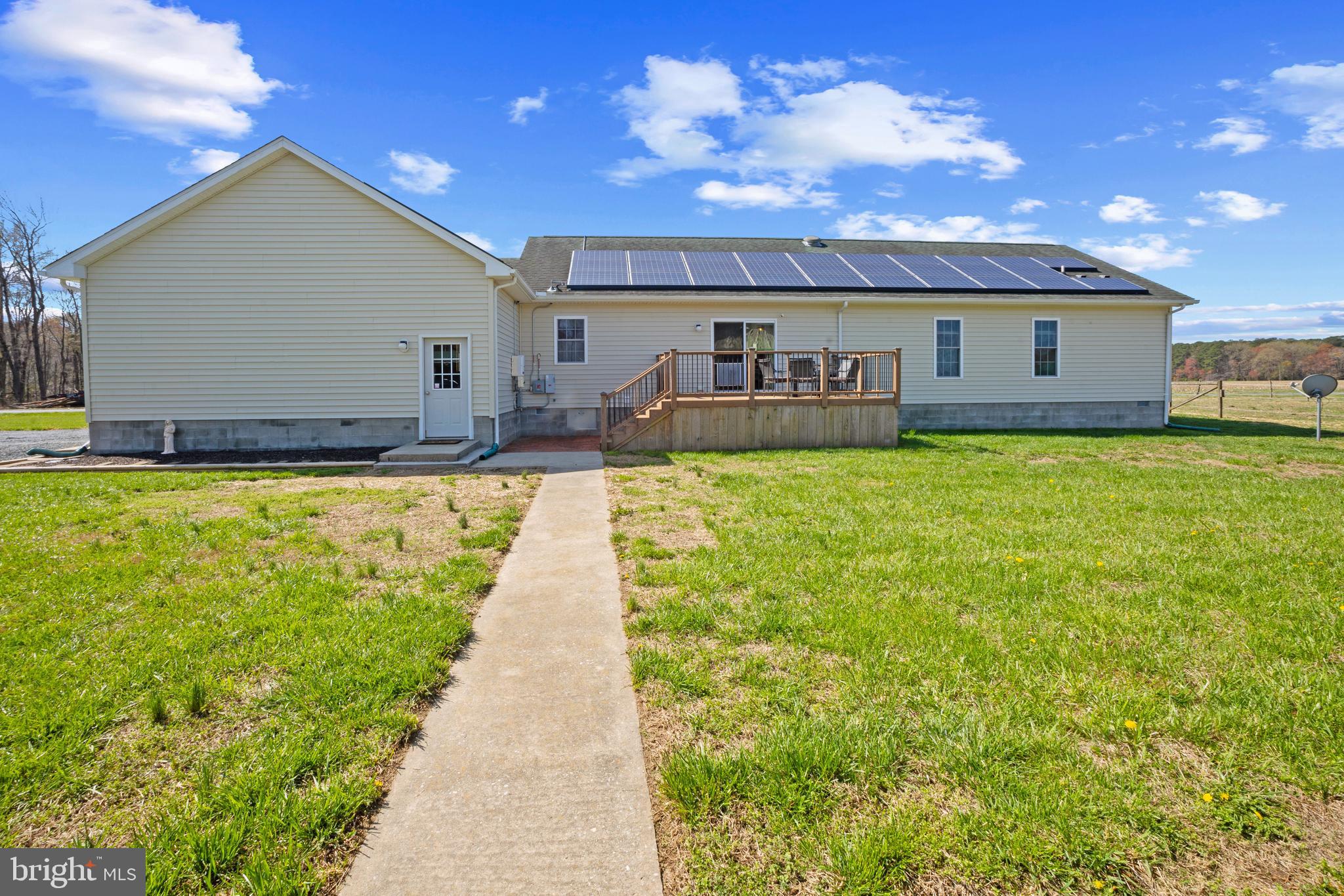 26268 Baker Road Denton, MD 21629 - Photo 35 of 55 a view of a house with a yard