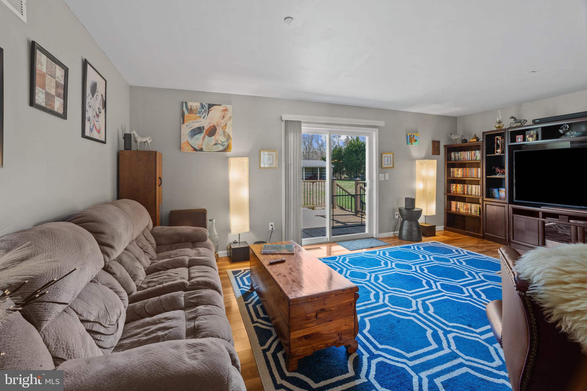 26268 Baker Road Denton, MD 21629 - Photo 5 of 55 a living room with furniture and a flat screen tv