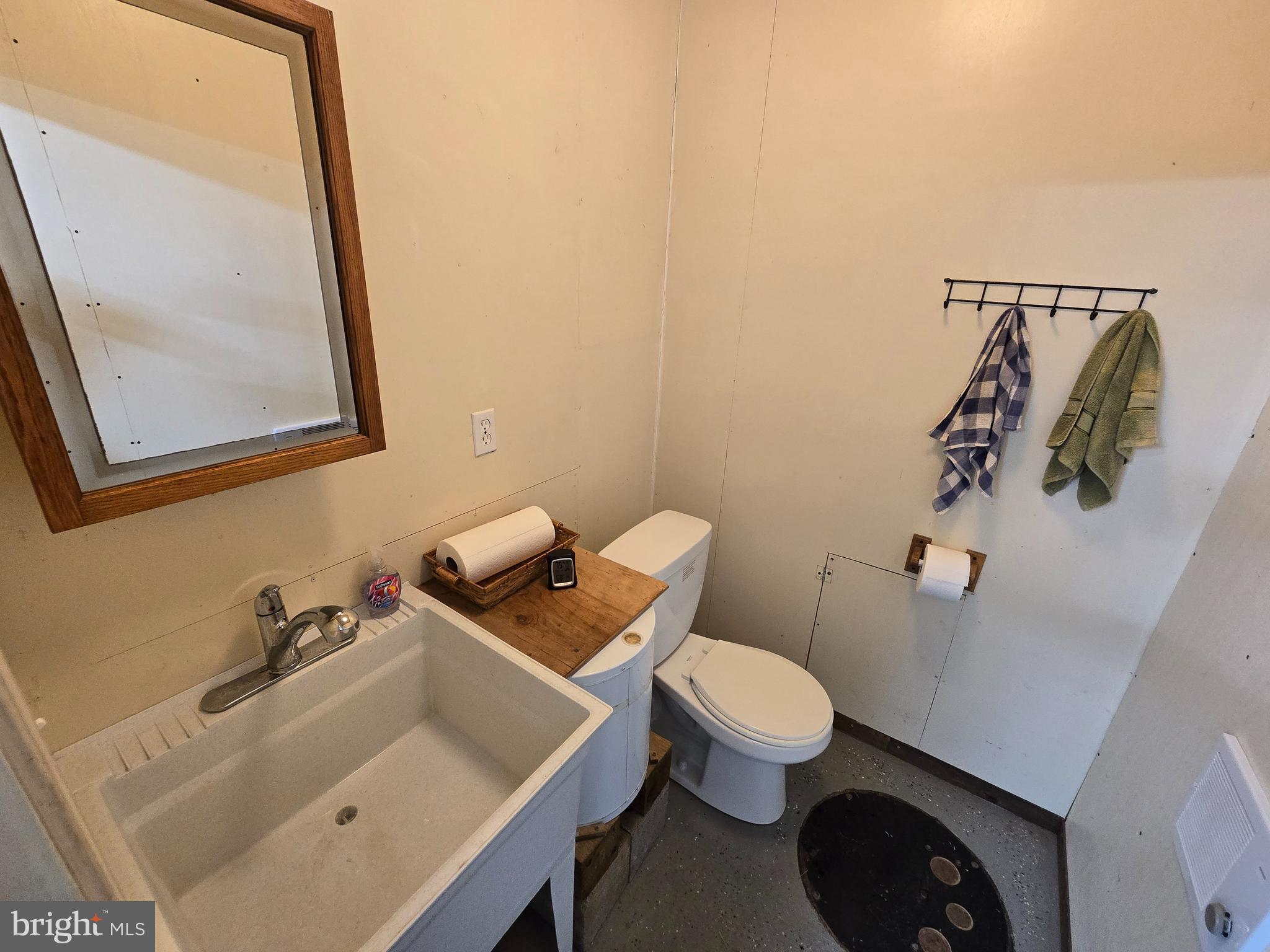 26268 Baker Road Denton, MD 21629 - Photo 51 of 55 a bathroom with a sink and a toilet