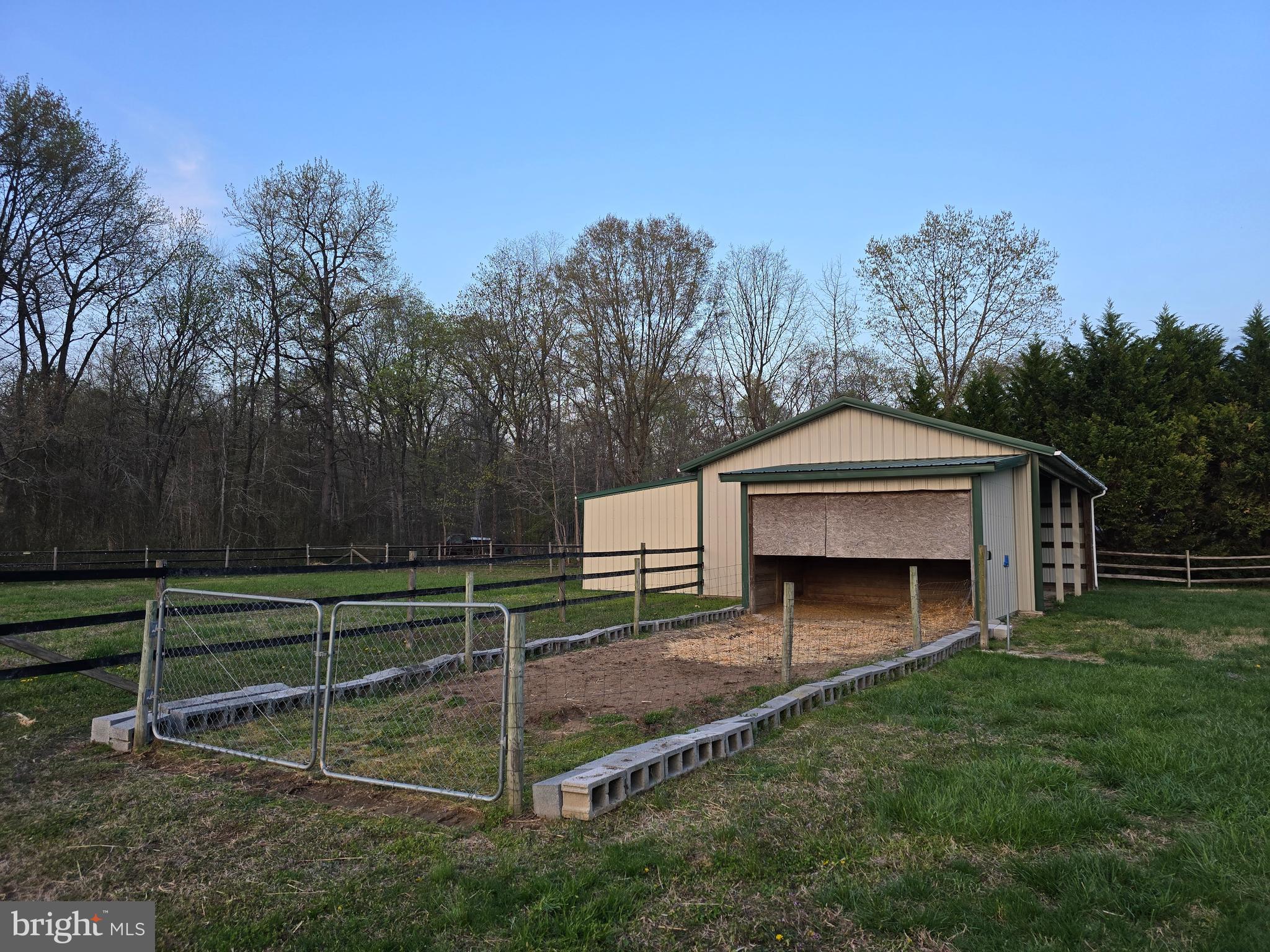 26268 Baker Road Denton, MD 21629 - Photo 54 of 55 a front view of a house with a garden