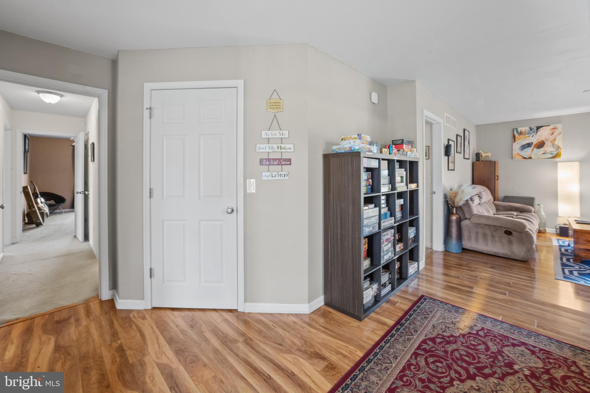 26268 Baker Road Denton, MD 21629 - Photo 8 of 55 a bedroom with furniture and a book shelf