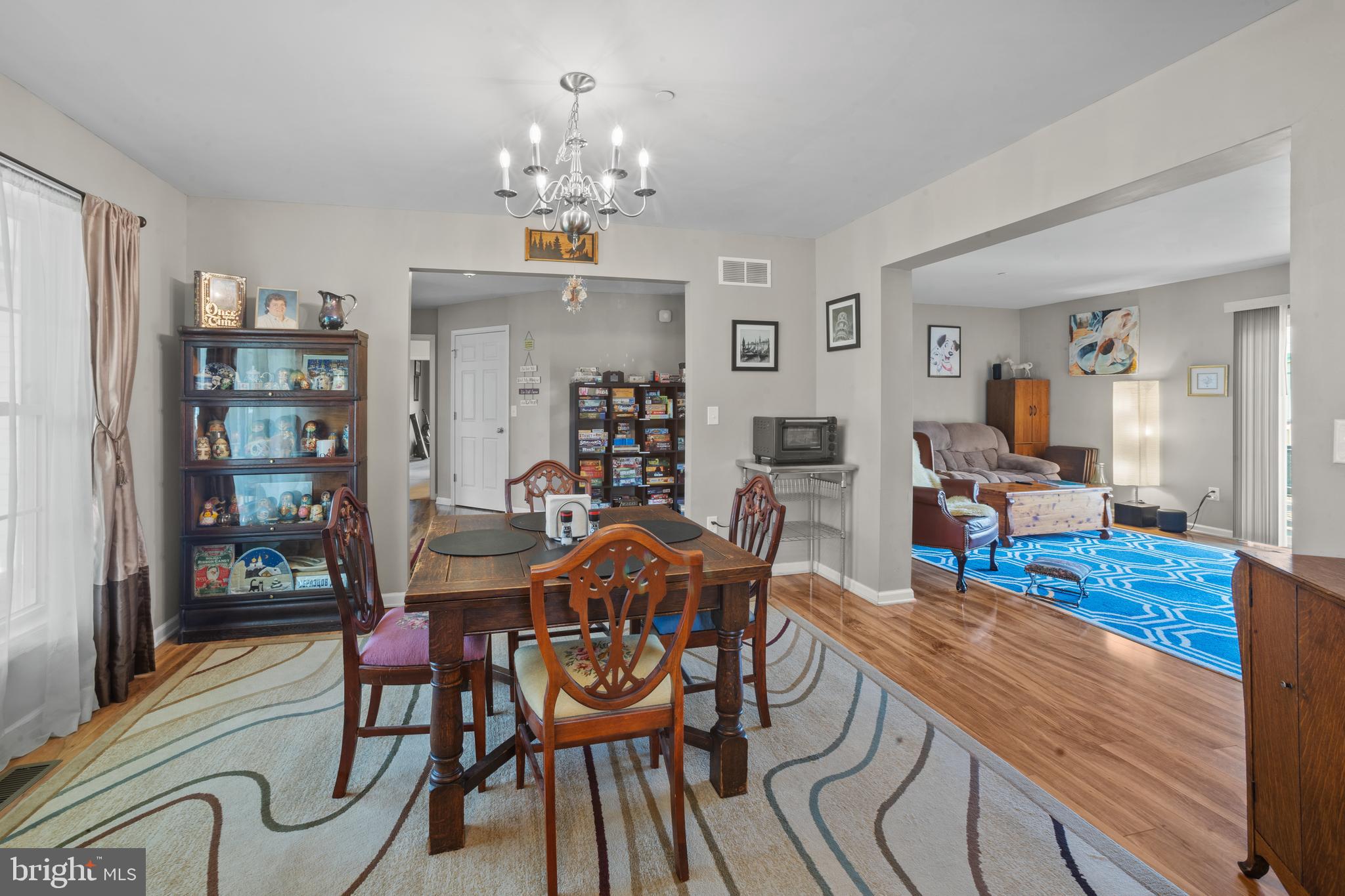 26268 Baker Road Denton, MD 21629 - Photo 9 of 55 a view of a dining room with furniture and wooden floor